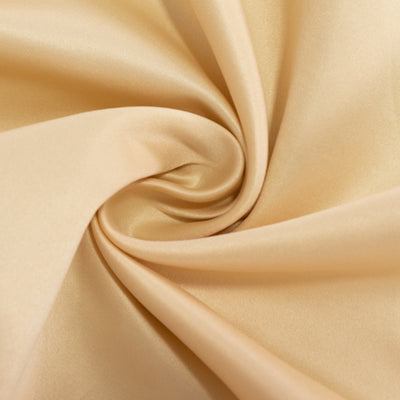 Satin fabric in soft beige color, showcasing smooth texture and elegant drape.