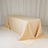 Beige satin tablecloth draped elegantly over a rectangular table.