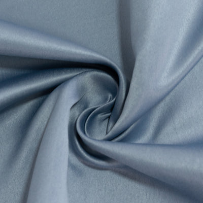 Light blue satin fabric with a smooth, luxurious texture.