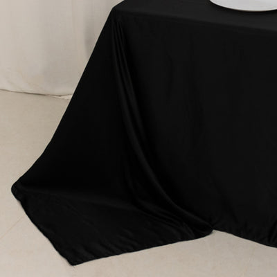 Black tablecloth draped elegantly on a surface.