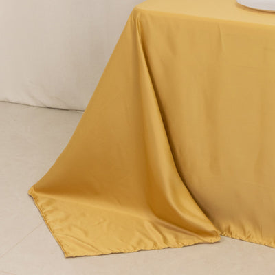 Yellow tablecloth draping elegantly over a table edge.