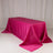 Pink satin tablecloth draped elegantly over a table.