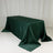 Green satin tablecloth draped over a rectangular table
