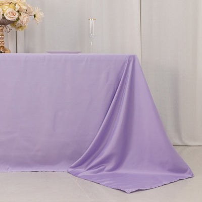 Purple tablecloth draped elegantly on a table in a styled setting.