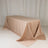 Beige tablecloth draped on a table in a studio setting.