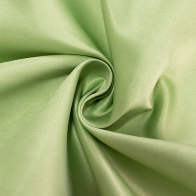 Soft green satin fabric in a swirling pattern.