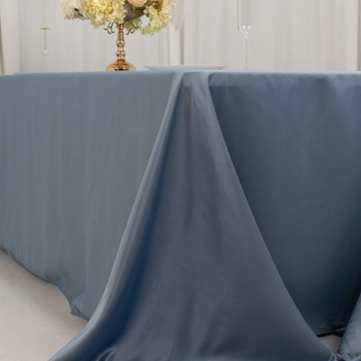 Elegant blue tablecloth draping over a table in a stylish setting.