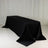 Black tablecloth draped elegantly over a rectangular table.