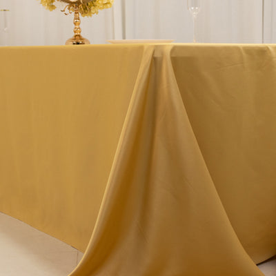 Yellow tablecloth draping elegantly over a table in a styled setting.