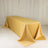 Golden tablecloth draped elegantly over a rectangular table