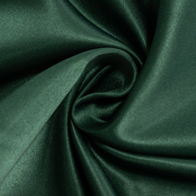 Deep green satin fabric with a smooth, luxurious texture.