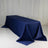 Navy tablecloth draped over a rectangular table in studio setting.