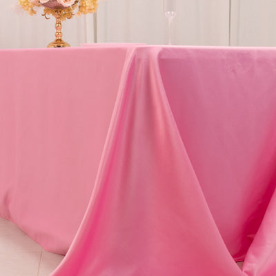 Pink tablecloth draped elegantly over a table for events or celebrations.