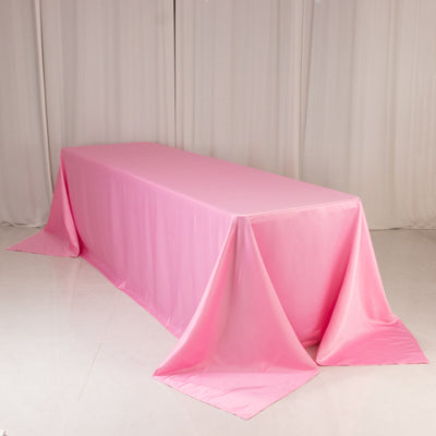 Pink tablecloth draped elegantly over a long table.