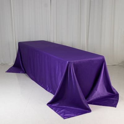 Purple tablecloth draped elegantly over a table