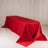 Red tablecloth draped elegantly over a table in a studio setting.