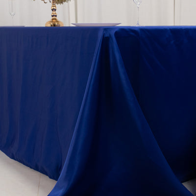 Blue satin tablecloth draped elegantly over a table.