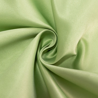 Smooth green satin fabric in a swirling pattern.