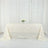 White textured tablecloth draped on a table with floral centerpiece.