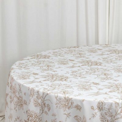 Elegant floral tablecloth on a round table in a soft neutral room