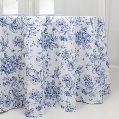 Floral-patterned tablecloth in blue and white on a table