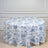 Floral print round tablecloth in blue and white on a plain background.