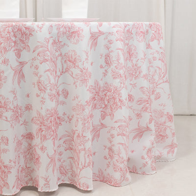 Pink floral tablecloth with elegant design and soft drape.