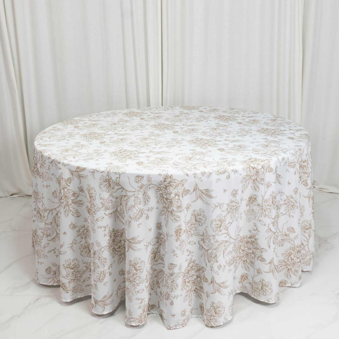 Round floral tablecloth in soft beige and white, elegant dining table cover