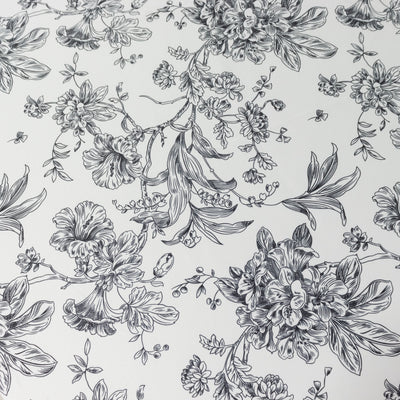 Black and white floral pattern design on a light background.