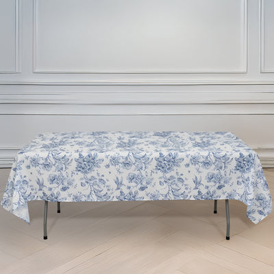 Floral print tablecloth draped over a folding table in an elegant setting.