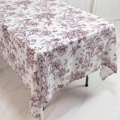 Floral print tablecloth on square table, white and burgundy design