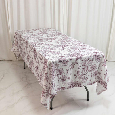 Floral patterned tablecloth on rectangular folding table indoors