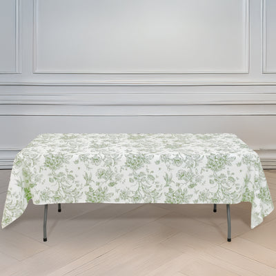Floral patterned tablecloth on a folding table in a styled interior setting.
