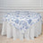 Floral round tablecloth in blue and white on a table