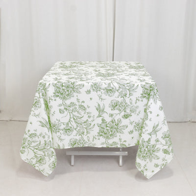 Floral patterned tablecloth on a plain backdrop