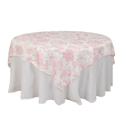 Round floral tablecloth in pink and white design.