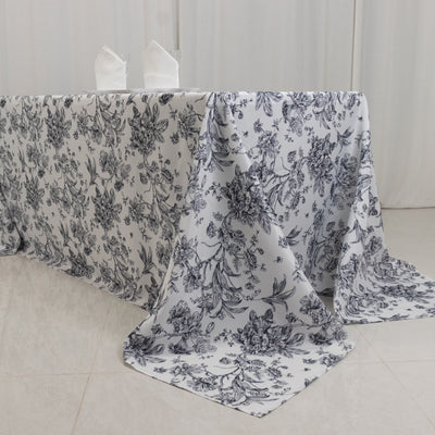 Floral patterned tablecloth draped elegantly over a table.