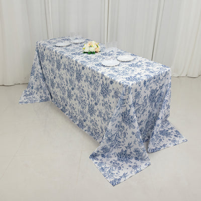 Floral tablecloth draped over a table, perfect for elegant dining decor.