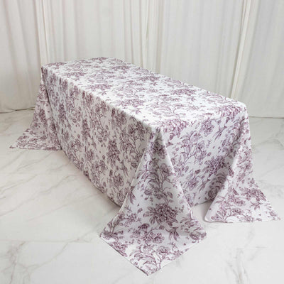 Floral tablecloth on rectangular table in white room