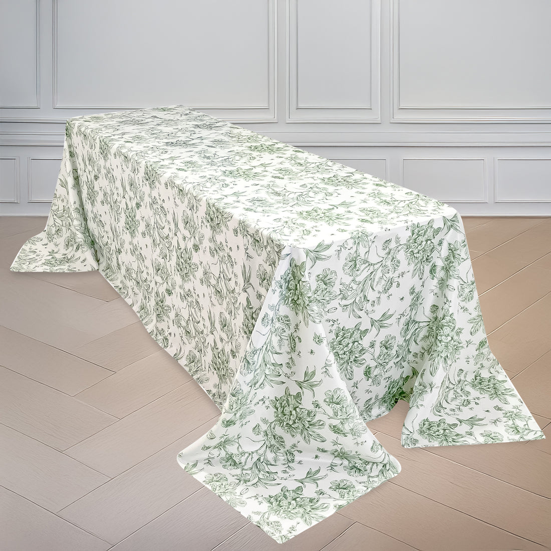 Floral tablecloth draped over a table in an elegant setting.