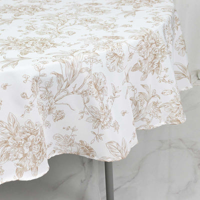 Floral white tablecloth with gold botanical print on dining table