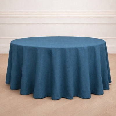 Round teal tablecloth elegantly draped on a circular table.