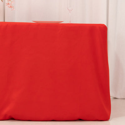 Red tablecloth draped elegantly over a table.