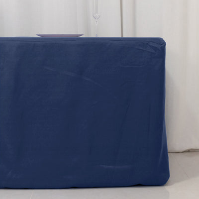 Blue table cover with a sleek design on a simple backdrop.