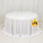 White round table with a draped tablecloth, suitable for events or dining.