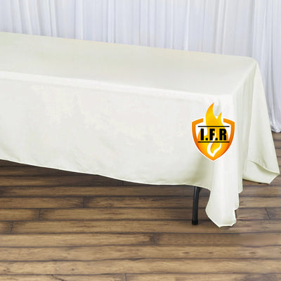 White tablecloth with logo on wooden floor.