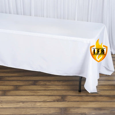White tablecloth draped over a table with L.F.R. logo