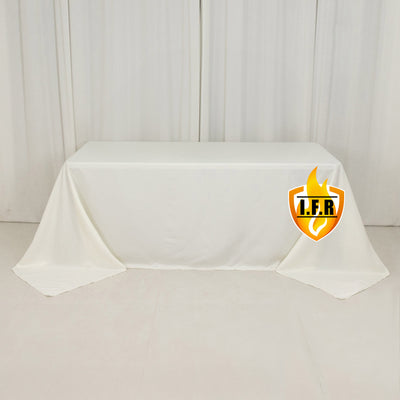 White table covered with a cloth, featuring L.F.R. logo.