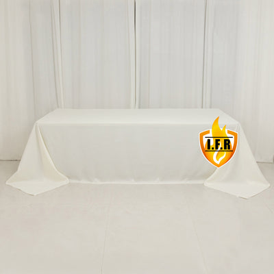 White tablecloth draped on a table with logo in the corner