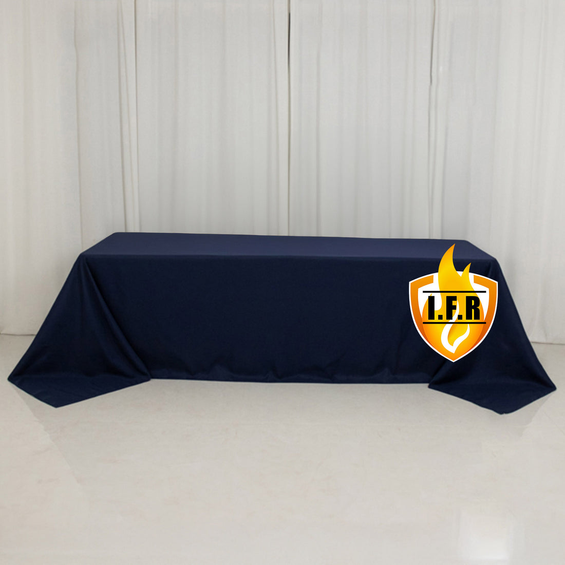 Navy tablecloth with L.F.R. logo on a plain backdrop